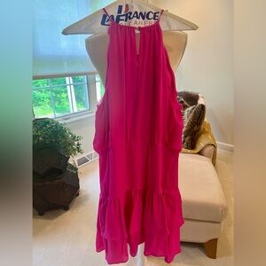 Parker size L , fuchsia, silk sundress with keyhole front and ruffled skirt.